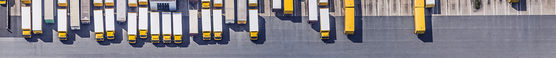 Aerial_view_of_postal_truck trailers_1920x200px